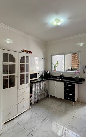 Casa à venda com 101m², 3 quartos e 2 vagas Casa à venda com 101m², 3 quartos e 2 vagasCozinha