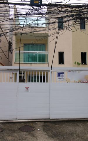 Casa à venda com 157m², 2 quartos e 2 vagasFachada da casa