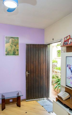 Casa à venda com 134m², 2 quartos e 2 vagasSala de TV