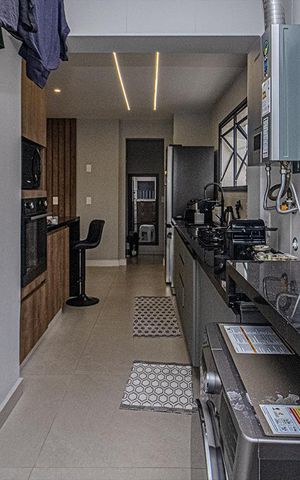Apartamento à venda com 127m², 3 quartos e 2 vagas Apartamento à venda com 127m², 3 quartos e 2 vagascozinha e área de serviço compartilhadas_4