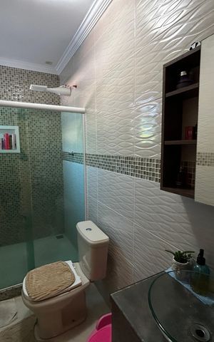 Casa de condomínio à venda com 128m², 3 quartos e 1 vagaBanheiro