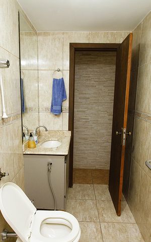 Casa à venda com 360m², 4 quartos e 4 vagasBanheiro Social casa 1