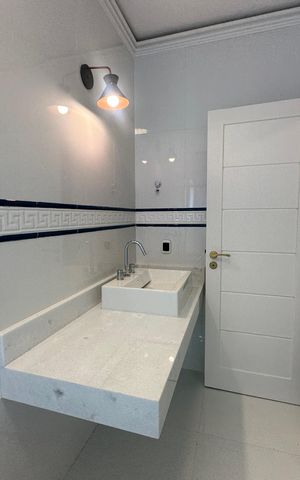 Casa de condomínio à venda com 500m², 4 quartos e 4 vagas Casa de condomínio à venda com 500m², 4 quartos e 4 vagasBanheiro da Suíte 1