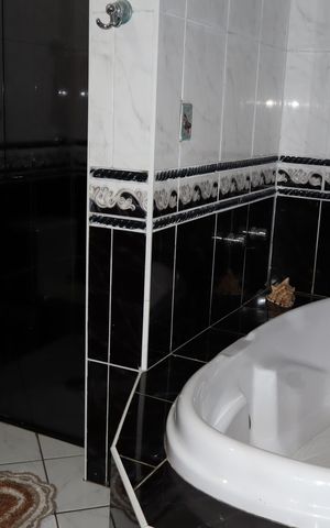 Casa à venda com 125m², 4 quartos e 2 vagasBanheiro Suíte casa 1 (térrea)