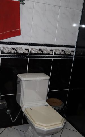 Casa à venda com 125m², 4 quartos e 2 vagasBanheiro Suíte casa 1 (térrea)