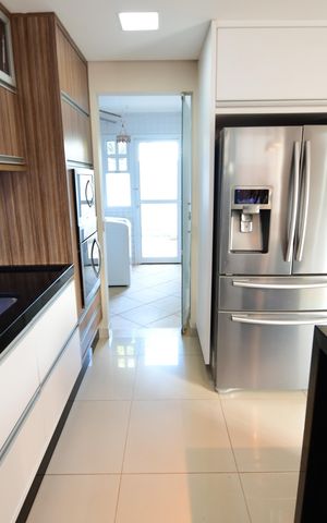 Casa de condomínio para alugar com 340m², 3 quartos e 4 vagasCozinha
