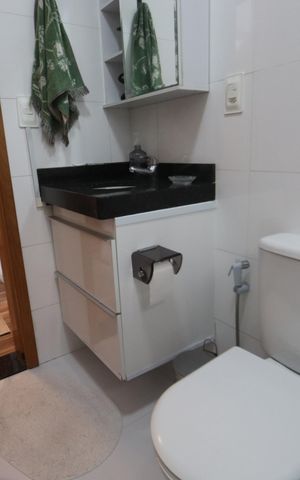 Casa de condomínio à venda com 142m², 3 quartos e 4 vagasBanheiro Social