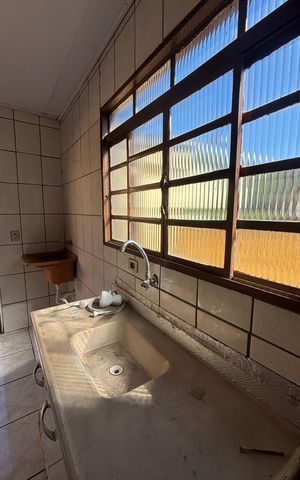 Casa à venda com 250m², 4 quartos e 5 vagas Casa à venda com 250m², 4 quartos e 5 vagasCozinha