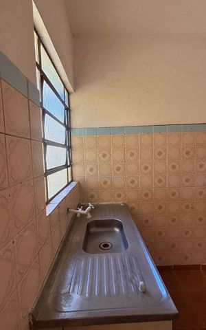 Casa à venda com 250m², 4 quartos e 5 vagas Casa à venda com 250m², 4 quartos e 5 vagasCozinha