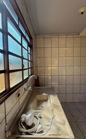 Casa à venda com 250m², 4 quartos e 5 vagas Casa à venda com 250m², 4 quartos e 5 vagasCozinha