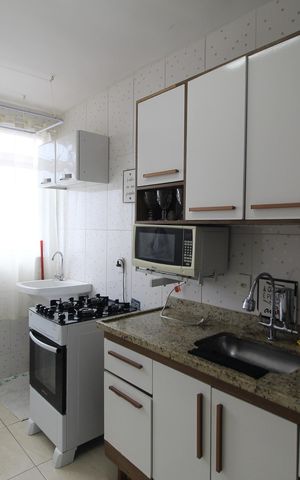 Apartamento à venda com 50m², 2 quartos e 1 vagaCozinha e Área de Serviço