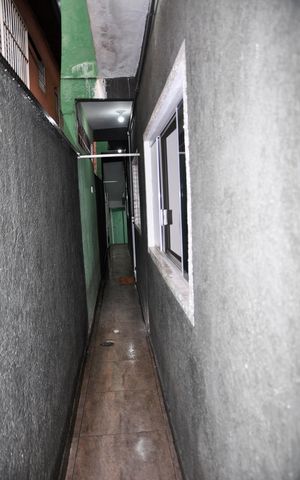 Casa à venda com 120m², 2 quartos e 2 vagas Casa à venda com 120m², 2 quartos e 2 vagasDetalhe - Corredor Externo