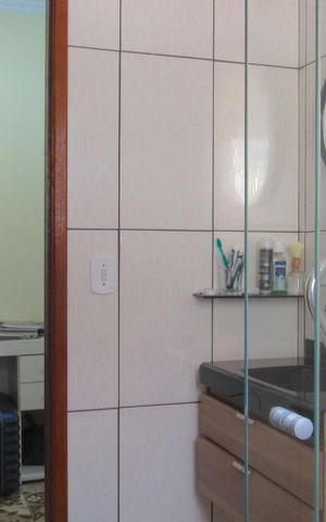 Casa à venda com 205m², 4 quartos e 2 vagasBanheiro da Suíte