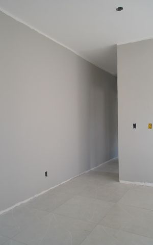 Casa à venda com 48m², 2 quartos e 2 vagasSala