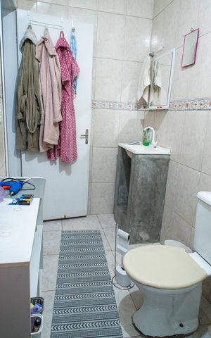 Casa à venda com 330m², 4 quartos e 2 vagas Casa à venda com 330m², 4 quartos e 2 vagasBanheiro Suíte 2