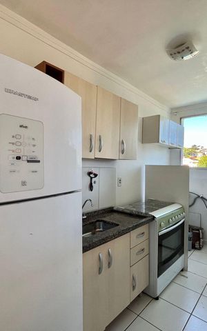 Apartamento à venda com 47m², 2 quartos e 1 vaga Apartamento à venda com 47m², 2 quartos e 1 vagaCozinha e Área de Serviço