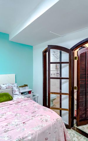 Casa à venda com 300m², 6 quartos e sem vagaQuarto 2 - Suíte