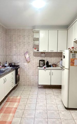 Casa à venda com 111m², 3 quartos e 2 vagas Casa à venda com 111m², 3 quartos e 2 vagasCozinha