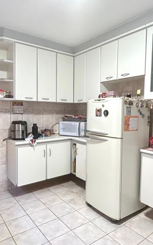 Casa à venda com 111m², 3 quartos e 2 vagas Casa à venda com 111m², 3 quartos e 2 vagasCozinha