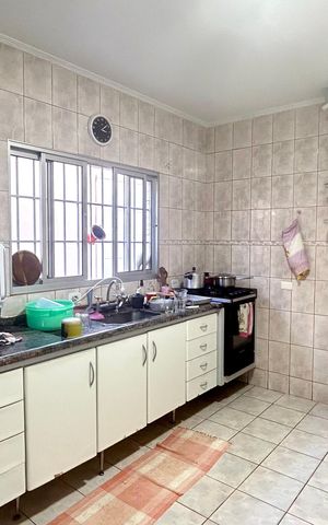 Casa à venda com 111m², 3 quartos e 2 vagas Casa à venda com 111m², 3 quartos e 2 vagasCozinha