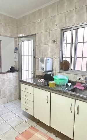 Casa à venda com 111m², 3 quartos e 2 vagas Casa à venda com 111m², 3 quartos e 2 vagasCozinha