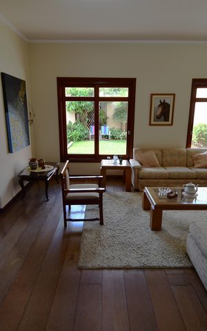 Casa de condomínio à venda com 381m², 4 quartos e 4 vagasSala