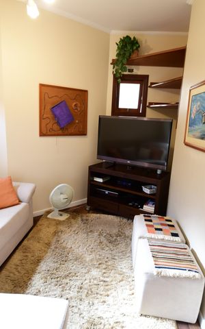 Casa de condomínio à venda com 381m², 4 quartos e 4 vagasSala de TV