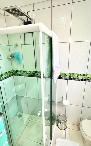 Casa de condomínio à venda com 128m², 3 quartos e 2 vagas Casa de condomínio à venda com 128m², 3 quartos e 2 vagasBanheiro da Suíte