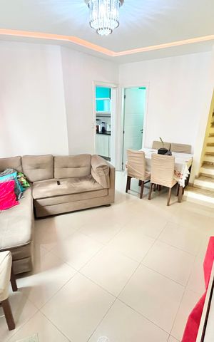 Casa de condomínio à venda com 128m², 3 quartos e 2 vagas Casa de condomínio à venda com 128m², 3 quartos e 2 vagasSala