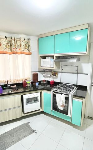 Casa de condomínio à venda com 128m², 3 quartos e 2 vagas Casa de condomínio à venda com 128m², 3 quartos e 2 vagasCozinha