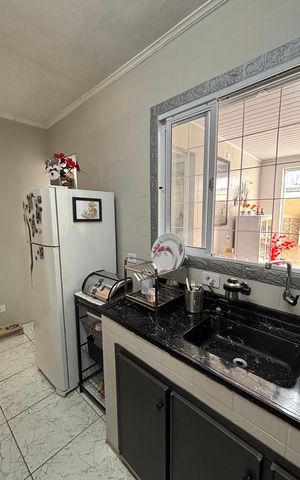 Casa à venda com 195m², 2 quartos e 2 vagas Casa à venda com 195m², 2 quartos e 2 vagasCozinha