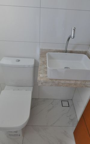 Casa à venda com 120m², 3 quartos e 2 vagasBanheiro da  Suíte 1