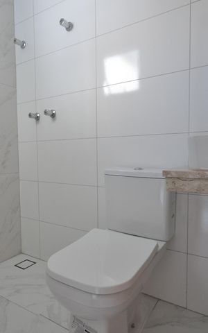 Casa à venda com 120m², 3 quartos e 2 vagasBanheiro da  Suíte 1