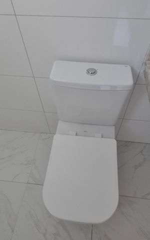 Casa à venda com 120m², 3 quartos e 2 vagasBanheiro da  Suíte 1
