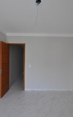 Casa à venda com 120m², 3 quartos e 2 vagasSuíte 1