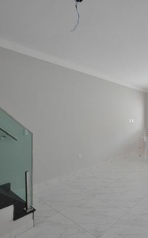 Casa à venda com 120m², 3 quartos e 2 vagasSala