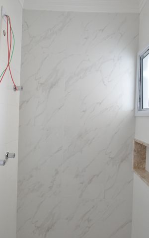 Casa à venda com 120m², 3 quartos e 2 vagasBanheiro da Suíte 1