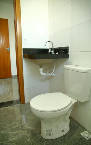 Casa à venda com 140m², 3 quartos e 2 vagasBanheiro Suíte 1 