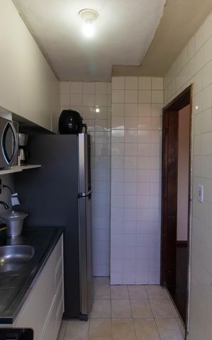 Apartamento à venda com 58m², 2 quartos e 1 vaga Apartamento à venda com 58m², 2 quartos e 1 vagaCozinha e Área de Serviço