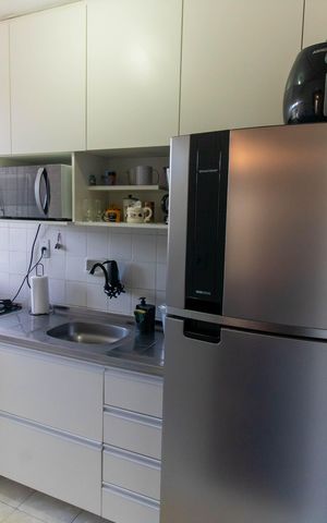 Apartamento à venda com 58m², 2 quartos e 1 vaga Apartamento à venda com 58m², 2 quartos e 1 vagaCozinha e Área de Serviço
