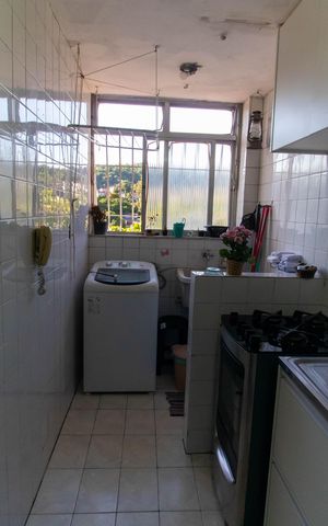 Apartamento à venda com 58m², 2 quartos e 1 vaga Apartamento à venda com 58m², 2 quartos e 1 vagaCozinha e Área de Serviço