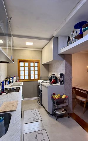 Casa à venda com 150m², 2 quartos e 2 vagas Casa à venda com 150m², 2 quartos e 2 vagasCozinha