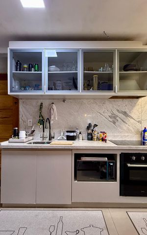 Casa à venda com 150m², 2 quartos e 2 vagas Casa à venda com 150m², 2 quartos e 2 vagasCozinha