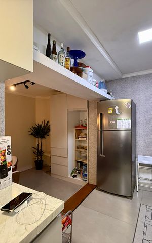 Casa à venda com 150m², 2 quartos e 2 vagas Casa à venda com 150m², 2 quartos e 2 vagasCozinha