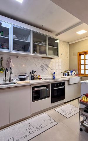 Casa à venda com 150m², 2 quartos e 2 vagas Casa à venda com 150m², 2 quartos e 2 vagasCozinha