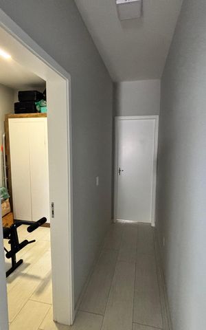 Casa à venda com 110m², 3 quartos e 2 vagas Casa à venda com 110m², 3 quartos e 2 vagasCorredor