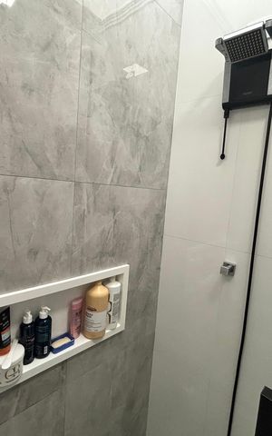Casa à venda com 110m², 3 quartos e 2 vagas Casa à venda com 110m², 3 quartos e 2 vagasBanheiro da Suíte 1