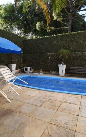 Casa de condomínio à venda com 280m², 5 quartos e 5 vagasÁrea externa com Piscina