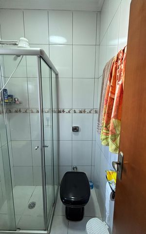 Casa à venda com 119m², 2 quartos e 2 vagas Casa à venda com 119m², 2 quartos e 2 vagasBanheiro da Suíte 2
