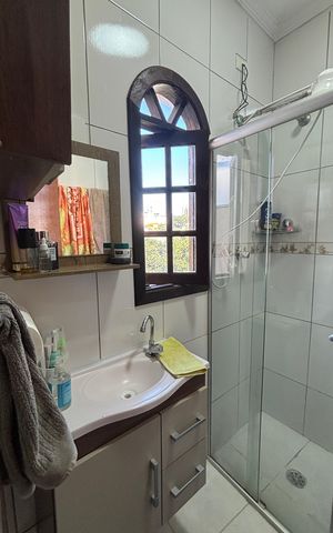 Casa à venda com 119m², 2 quartos e 2 vagas Casa à venda com 119m², 2 quartos e 2 vagasBanheiro da Suíte 2
